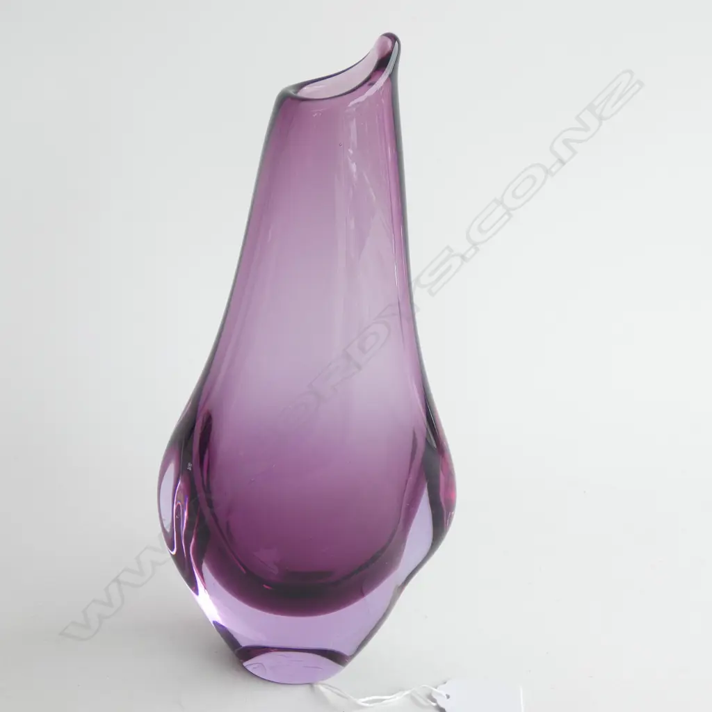 A purple art glass vase Image 1++